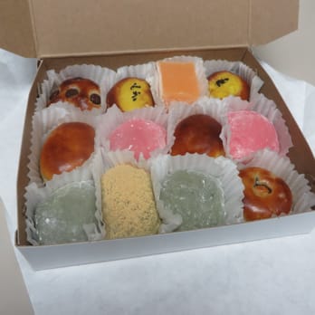 Sakura-ya - Top Row: Maruyaki manju, Imo manju, Orange mochi - Middle Row: Kuri manju, Pink mochi - Bottom Row: Green mochi, Kinako mochi - Bakeries Near Me - Gardena, California