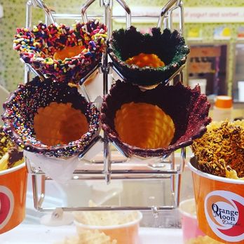 Orange Moon Delights - Design your cone the way you like, with nuts or sprinkles or even candy, the options are endless - Ice Cream & Frozen Yogurt Near Me - Augusta, Georgia Orange Moon Delights - Design your cone the way you like, with nuts or sprinkles or even candy, the options are endless - Ice Cream & Frozen Yogurt Near Me - Augusta, Georgia