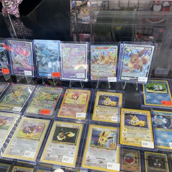 Pokestops - An 20¢ evee/bulk card that's priced at $75 - Toy Stores Near Me - Encino, California