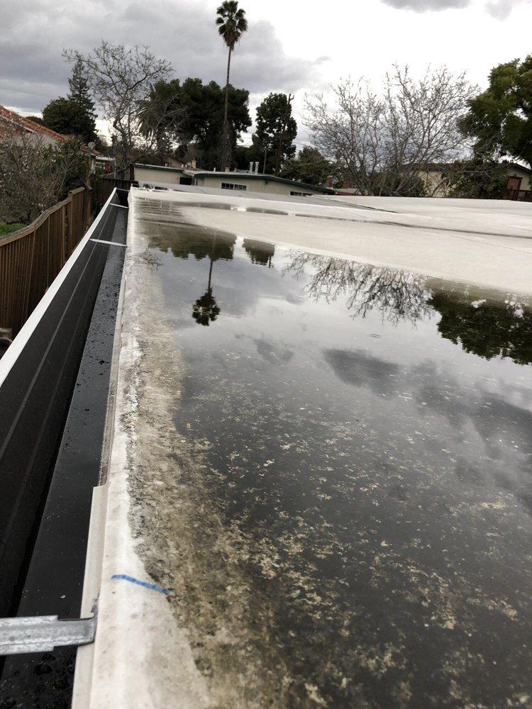 Slide of T D Roofing