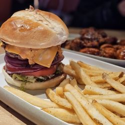 Dave & Buster's New York City - Times Square - Cheeseburger with lettuce, onion and tomato served with fries