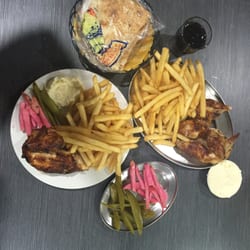 Yummy Charcoal Chicken - I like to call it happy chicken because my boyfriend takes me here and I feel so happy.  Chicken. Chips. Garlic sauce. Happiness.