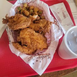 Four piece chicken strip basket with gravy and okra. Four piece chicken strip basket with gravy and okra.