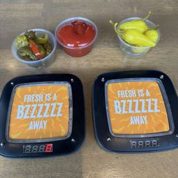 Peppers and jalapeños with your order buzzers Peppers and jalapeños with your order buzzers