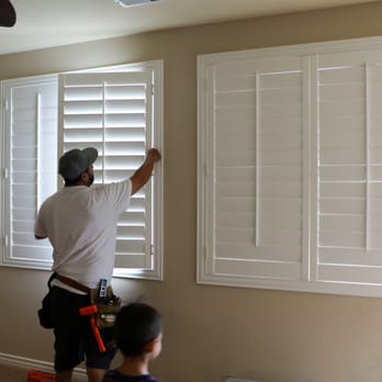 Hardwood Designs Plus - Jimmy making the final installation touches - Shutters Near Me