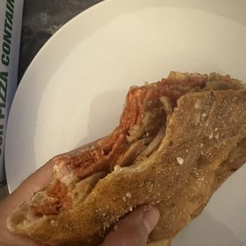 Papa's Pizza - Cut off a piece of the Italian calzone - Pizza Near Me - Galveston, Texas Papa's Pizza - Cut off a piece of the Italian calzone - Pizza Near Me - Galveston, Texas