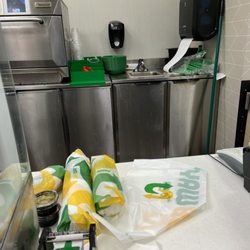 Take a look at the dirty counter tops and sink area.