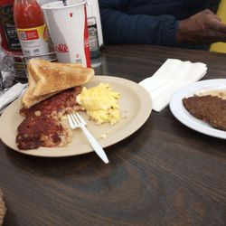 Stake in a Sack - Two eggs and bacon with hash brown and toast