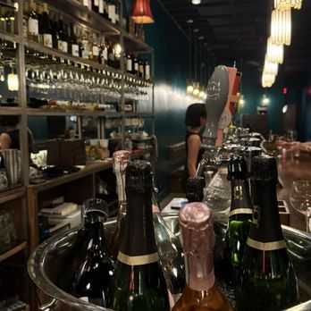 Wax Poetic - Opened wines & wines on tap in the background. - Wine Bars Near Me - Burbank, California