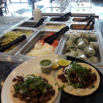Taqueria 4 Caminos - a variety of food items - Food Stands Near Me - Spring, Texas Taqueria 4 Caminos - a variety of food items - Food Stands Near Me - Spring, Texas