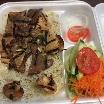 Pho’s Mekong Bistro - Combination Rice Platter (minus one shrimp I ate when I opened the box) - Vietnamese Near Me - Oklahoma City, Oklahoma Pho’s Mekong Bistro - Combination Rice Platter (minus one shrimp I ate when I opened the box) - Vietnamese Near Me - Oklahoma City, Oklahoma