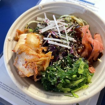 Bluefin Poke - Built my own with marinated salmon and tuna (cured) complete with seaweed salad, kimchi and zucchini noodles. Gluten free. - Hawaiian Near Me - Pensacola, Florida Bluefin Poke - Built my own with marinated salmon and tuna (cured) complete with seaweed salad, kimchi and zucchini noodles. Gluten free. - Hawaiian Near Me - Pensacola, Florida