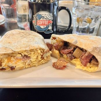 TJ’s Burritos & Coffee - Left-loaded potato burrito. Right-corned beef hash burrito - Mexican Near Me - Bloomfield, Connecticut TJ’s Burritos & Coffee - Left-loaded potato burrito. Right-corned beef hash burrito - Mexican Near Me - Bloomfield, Connecticut