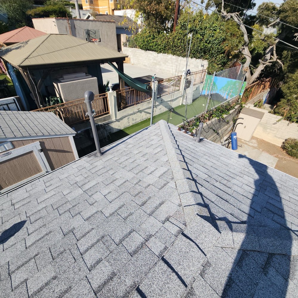 Slide of Pro Roofing Experts