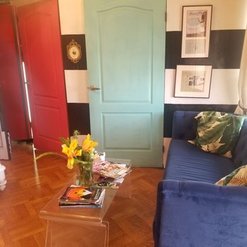 The Painted Lady Tanning & Spa - 2 doors to rooms in parlor room against striped wall. Surpurb used of color and space. - Massage Near Me - Napa, California The Painted Lady Tanning & Spa - 2 doors to rooms in parlor room against striped wall. Surpurb used of color and space. - Massage Near Me - Napa, California