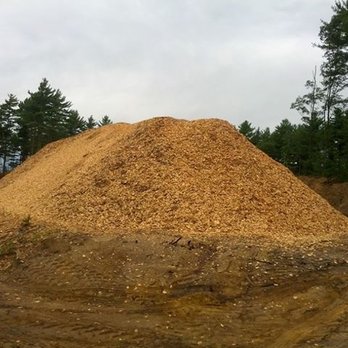 RC Melville Construction - a pile of wood chips - Landscaping Near Me - Carver, Massachusetts RC Melville Construction - a pile of wood chips - Landscaping Near Me - Carver, Massachusetts