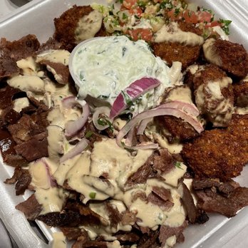 Nazareth Bread - Shawarma Platter (beef/lamb) | 3 sides: tabouli salad and double falafels. - Mediterranean Near Me - Greensboro, North Carolina Nazareth Bread - Shawarma Platter (beef/lamb) | 3 sides: tabouli salad and double falafels. - Mediterranean Near Me - Greensboro, North Carolina