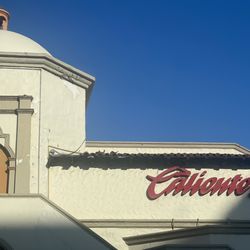 Caliente - Outside, parking.