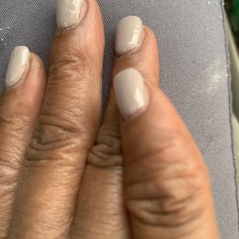 Ruby Nails - Gel or acrylic laid like a toddler put it on and they wouldn't fix their work!! He kept saying it was fine. This was $46 worth of crap!! - Nail Salons Near Me - Dearborn, Michigan