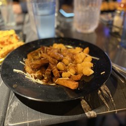 Iron Rail Pub & Grill - Poutine with cheese curds