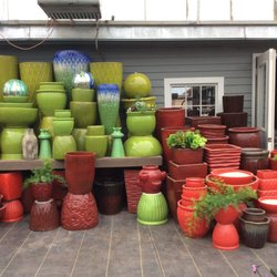 Sheila's Garden Market - We love to plant flowers in our beautiful pottery.