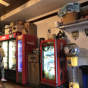 Slices Pizza - a row of vending machines in a restaurant - Pizza Near Me - Hastings-on-Hudson, New York Slices Pizza - a row of vending machines in a restaurant - Pizza Near Me - Hastings-on-Hudson, New York