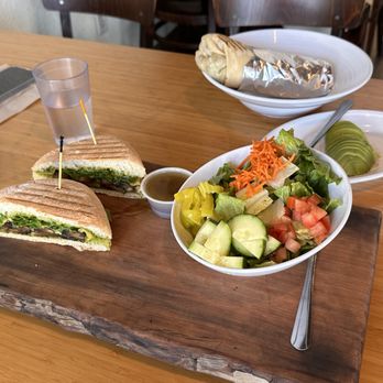 Rooted Eat More Plants - Pesto panini - Juice Bars & Smoothies Near Me - Medford, Oregon Rooted Eat More Plants - Pesto panini - Juice Bars & Smoothies Near Me - Medford, Oregon