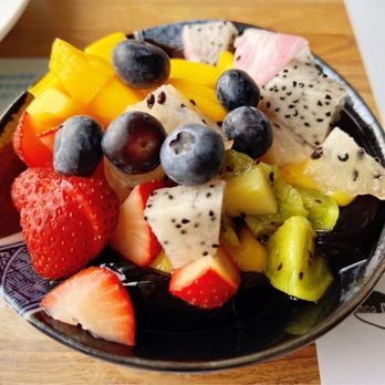 Mango Medley - a bowl of fruit on a table - Asian Fusion Near Me - San Francisco, California