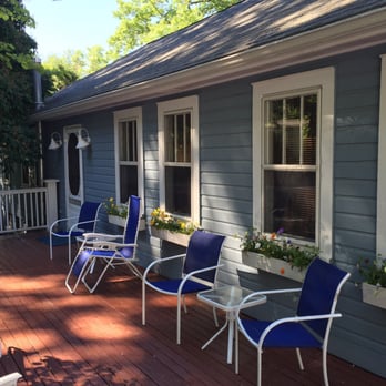Inn At Union Pier - The porch to our room. With a great view of the gardens. - Hotels Near Me - Union Pier, Michigan