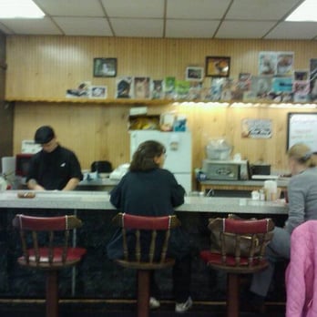 The Fountain - people sitting at a counter in a restaurant - Desserts Near Me - Jacksonville, Florida The Fountain - people sitting at a counter in a restaurant - Desserts Near Me - Jacksonville, Florida