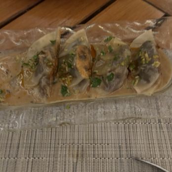 Hualani's - Supposed to be XOXO Dumplings with braised short ribs, xo butter sauce. - Hawaiian Near Me - Lihue, Hawaii