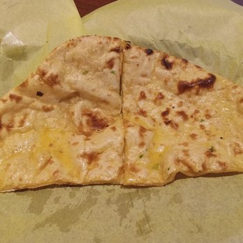 Spice Of India - Tandoori Roti is chewy whole wheat with a little ghee spread on it! - Indian Near Me - Hesperia, California Spice Of India - Tandoori Roti is chewy whole wheat with a little ghee spread on it! - Indian Near Me - Hesperia, California