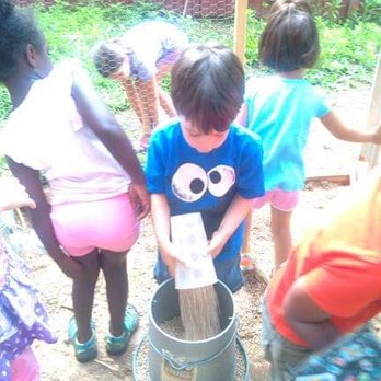 Touchstone Community School - Feeding the chickens - Elementary Schools Near Me - Grafton, Massachusetts