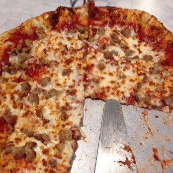 The Pickle - Pizza special: one topping deal. I chose sausage. All around a winner! Great dough, good cheese, good sauce. - Salad Near Me - Lafayette, Indiana
