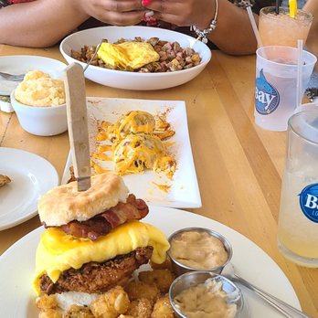 Bay Local Eatery - Big sand with chicken breast eggs bacon and side of sausage gravy - Breakfast & Brunch Near Me - Virginia Beach, Virginia Bay Local Eatery - Big sand with chicken breast eggs bacon and side of sausage gravy - Breakfast & Brunch Near Me - Virginia Beach, Virginia