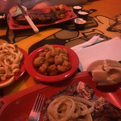Fricker's - Chicken and ribs platter. Steak and shrimp