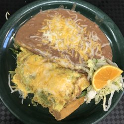 Malu’s Kitchen - Chile relleno with beans topped with cheese