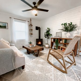 Jimenez Construction - a living room with a white couch and a white chair - General Contractors Near Me - San Francisco, California