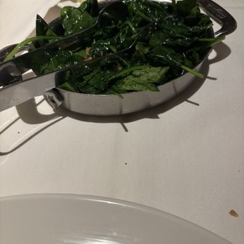 The Capital Grille - Saut-ed Spinach with Garlic Confit - Steakhouses Near Me - Fairfax, Virginia The Capital Grille - Saut-ed Spinach with Garlic Confit - Steakhouses Near Me - Fairfax, Virginia