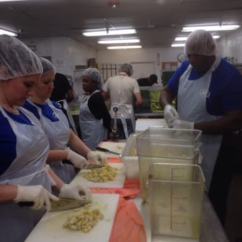 DC Central Kitchen - volunteers chopping up artichoke hearts for salad - Community Service/Non-Profit Near Me - Washington, DC, District of Columbia