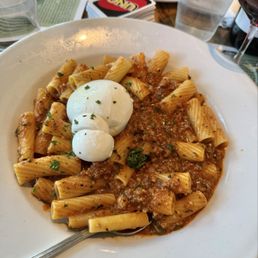 Bolognese and burrata pasta dish Bolognese and burrata pasta dish