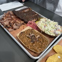 Mostly Smoked - Brisket and ribs platter with beans and coleslaw