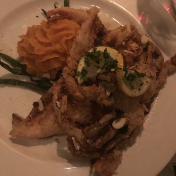 Irene's - Fresh, gulf fish, with a crab topping. - Italian Near Me - New Orleans, Louisiana Irene's - Fresh, gulf fish, with a crab topping. - Italian Near Me - New Orleans, Louisiana