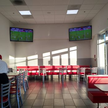 Tacos Gavilan - Interior with soccer showing on multiple big screen TV's overhead. - Mexican Near Me - South Gate, California Tacos Gavilan - Interior with soccer showing on multiple big screen TV's overhead. - Mexican Near Me - South Gate, California