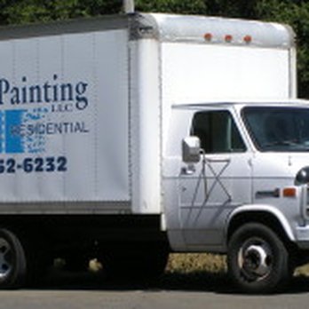 Hoeks Painting - a truck parked on the side of the road - Painters Near Me Hoeks Painting - a truck parked on the side of the road - Painters Near Me