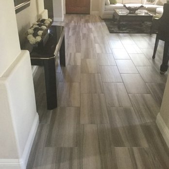 Shower and Bath Connection - We love our new floor. Thanks Lon for your help in choosing the tile! - General Contractors Near Me