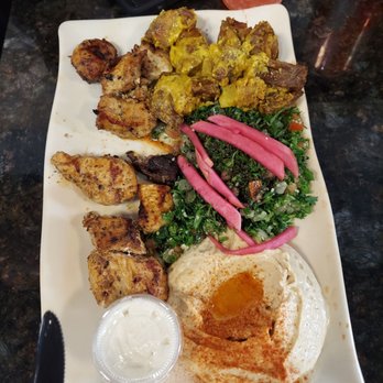 Habibi Lebanese Semoran - Chicken platter with hummus, tabouleh, and spicy potatoes - Lebanese Near Me - Orlando, Florida