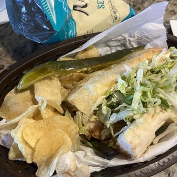 Darrell's - Darrell special Poboy with sea salt chips - Sandwiches Near Me - Lake Charles, Louisiana Darrell's - Darrell special Poboy with sea salt chips - Sandwiches Near Me - Lake Charles, Louisiana
