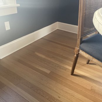 Benjamin Floors - a chair and a sink in a room - Flooring Near Me Benjamin Floors - a chair and a sink in a room - Flooring Near Me