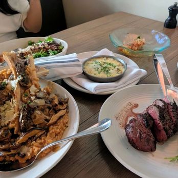 Red Ash - 10 Oz Beef Filet With Fresh Blue Crab Fonduta and Bone Marrow With Mushroom Risotto - Italian Near Me - Austin, Texas Red Ash - 10 Oz Beef Filet With Fresh Blue Crab Fonduta and Bone Marrow With Mushroom Risotto - Italian Near Me - Austin, Texas